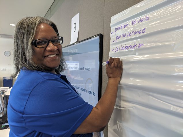 IMG_20200227_083525 Teacher writing on a white board
