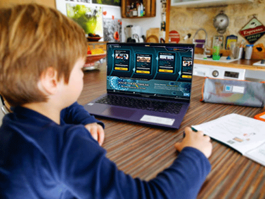 Virtual Healthy School young boy on a laptop computer