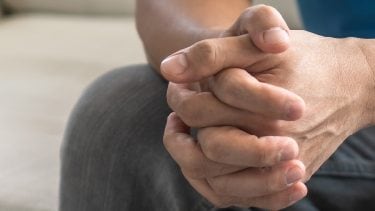 clasped hands photo of hands
