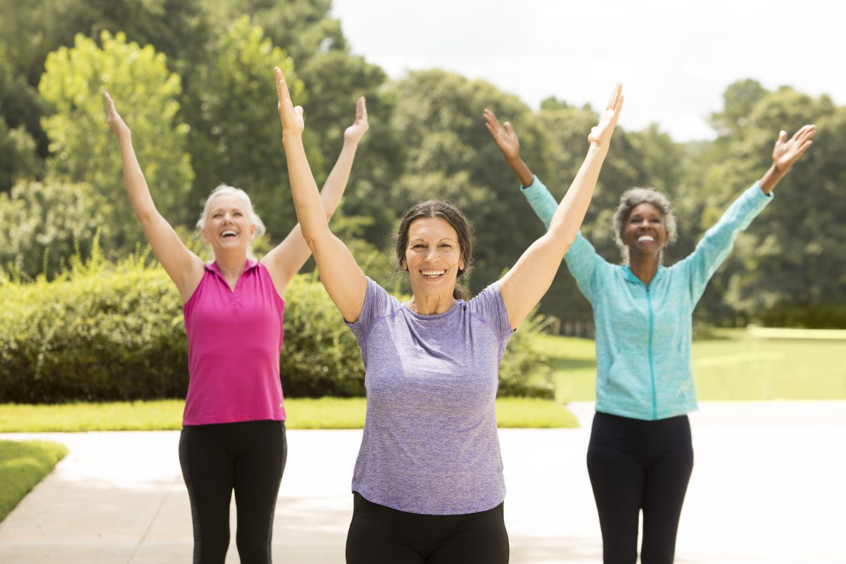 Older women exercising outdoors