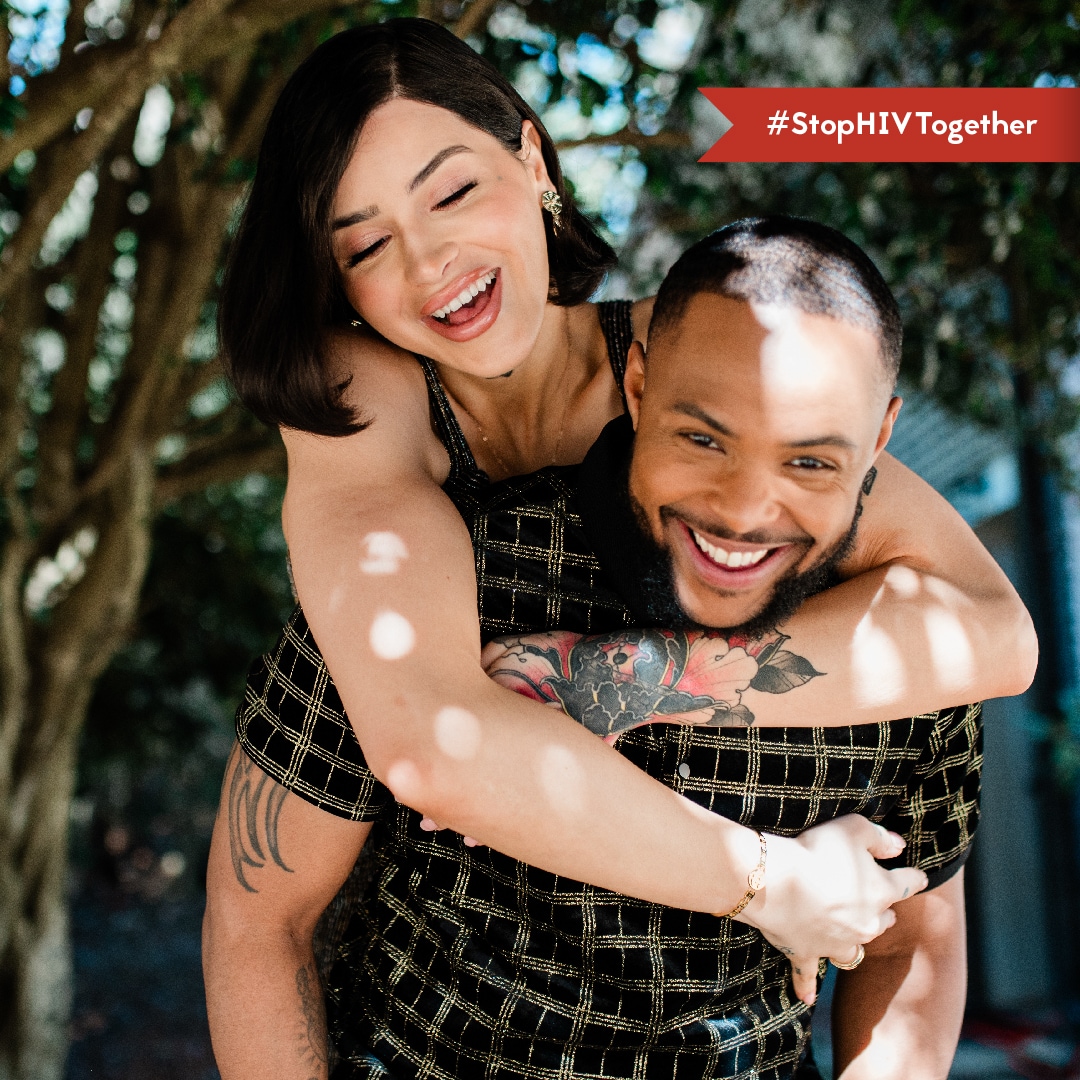 Ocean & Jamal Graphic An image of a trans woman embracing her trans masculine partner affectionately.