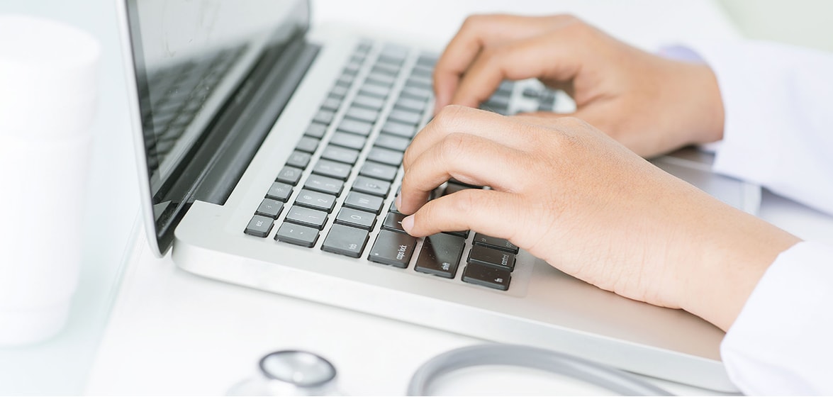 1_banner_general-resources_1175x560 Image of a woman typing on a computer