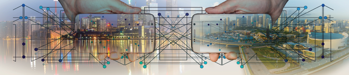 two mobile phones with lines connecting and city in the background