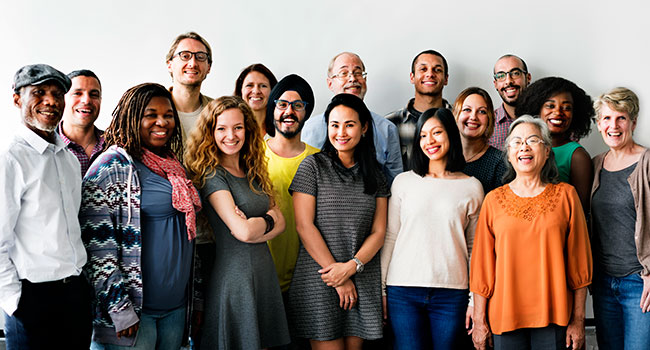 People of different ethnicities standing in a line