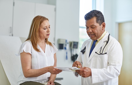 Female patient and male doctor Female patient and male doctor
