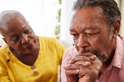 african american couple looking concerned