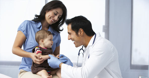 Mother and baby at a doctor visit.