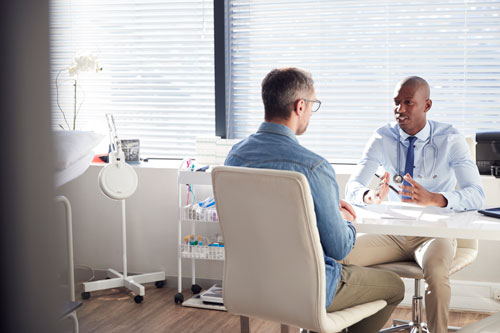 Photo of a doctor with his patient