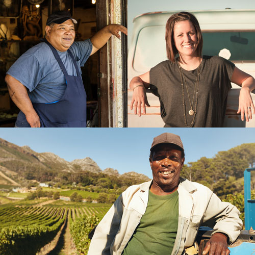 Photo of two men and a woman in a regional setting.