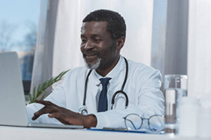 Doctor at a computer Doctor at a computer