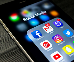 Social media icons on mobile phone