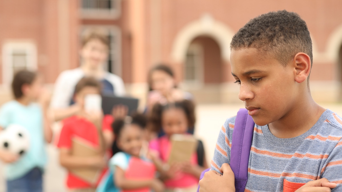 young boy being bullied at school