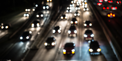 Photo: Multiple cars on a highway at night