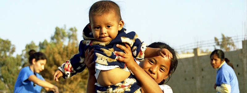Children in a border town along the U.S.-Mexico border. Photo credit: Maureen Fonseca-Ford, SBHMB Children in a border town along the U.S.-Mexico border. Photo credit: Maureen Fonseca-Ford, SBHMB