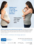 Pregnant woman talking to mom holding her infant