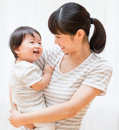 mother-holding-child-lg Mother holding infant son.