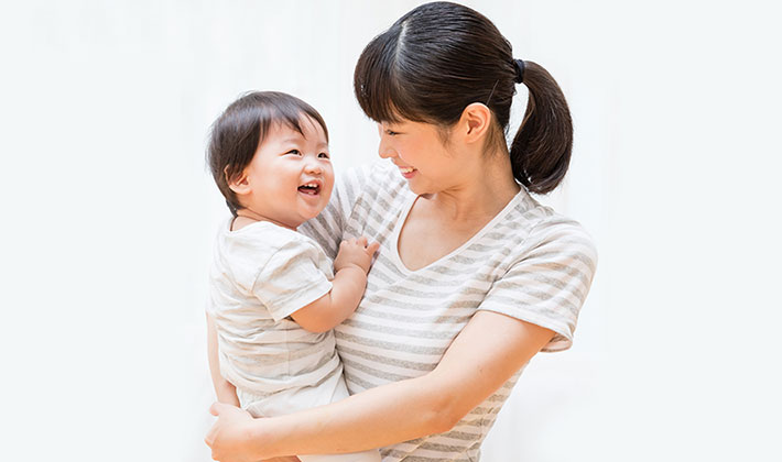 Mother holding her child