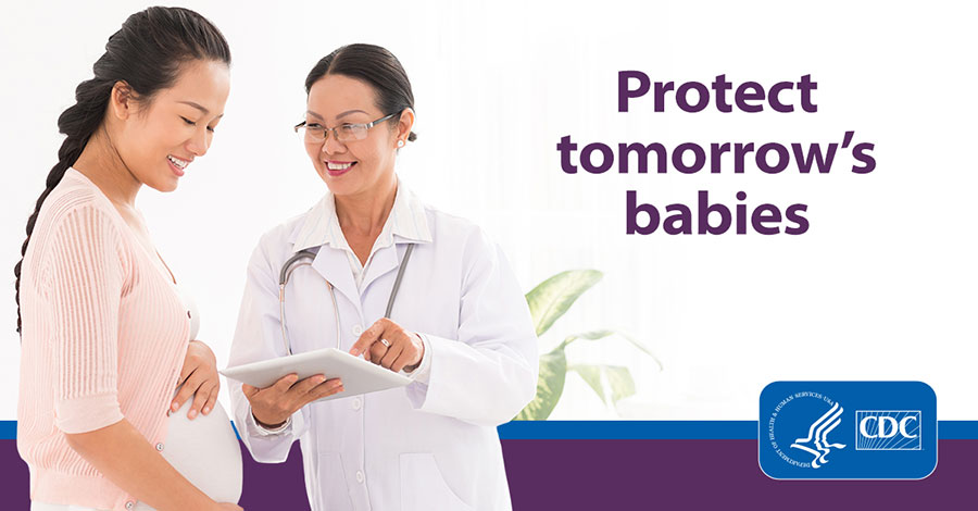 doctor-talking-patient.jpg Female doctor consulting with pregnant patient.