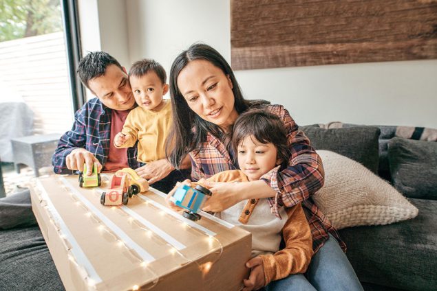Parents playing with their kids.