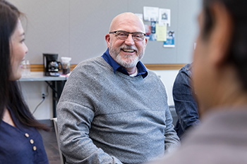 elderly-man-vision-health elderly man talking to people
