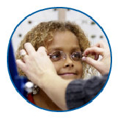 Title child with Refractive Errors wearing glasses