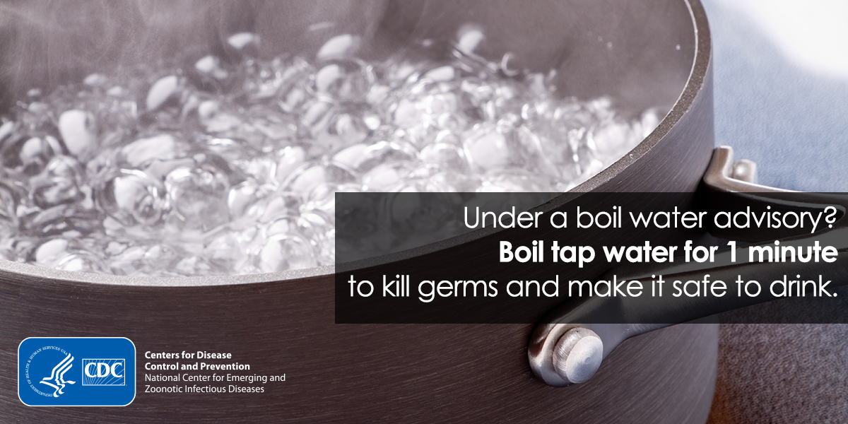Close-up view of a pot of boiling water. Text overlay says, "Under a boil water advisory? Boil tap water for 1 minute to kill germs and make it safe to drink."