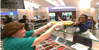 Serving food at Johns Hopkins cafeteria