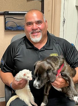 Emanuel Maciel at work with animals.