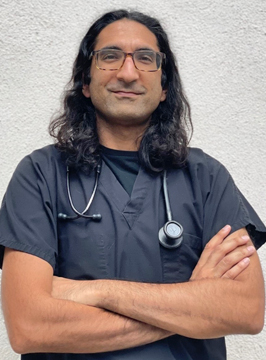 Dr. Kunal Sukhija in uniform at work.