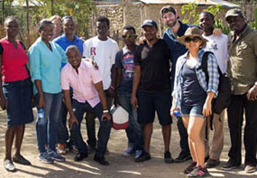 Rabies Affects the Most Vulnerable in Haiti EIS officer Cuc Tran (third from the right) and OC Hubert fellow Maxwell Kligerman (behind Tran) with the team in Haiti.